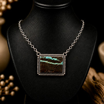 Blackjack Turquoise bar necklace handcrafted by Native American artist Albert Dawes