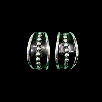Sterling Silver earrings handcrafted by Native American artist Tom Hawk