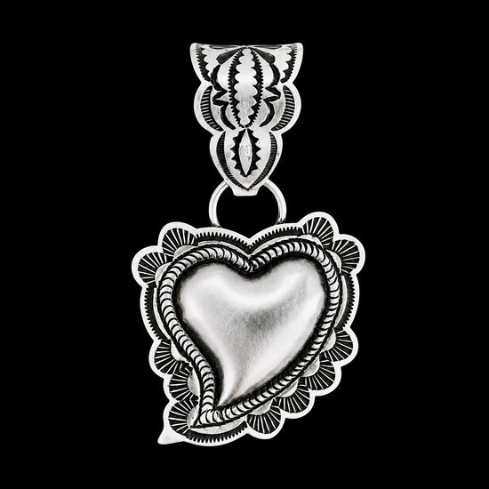Sterling Silver pendant handcrafted by Native American artist Leander Tahe