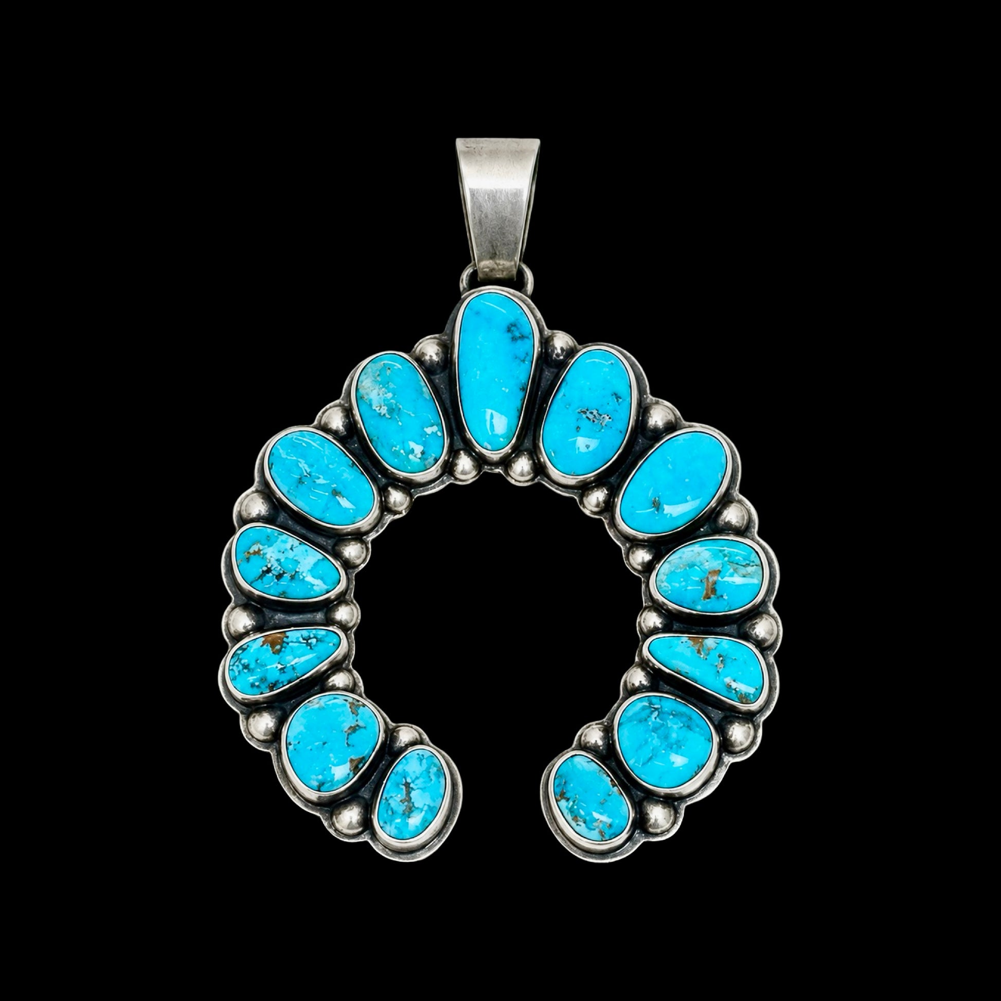 Natural Morenci Turquoise pendant handcrafted by Native American artist Bobby Johnson