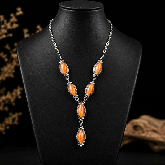 Orange Spiny Oyster lariat handcrafted by Native American artist Robert Martinez