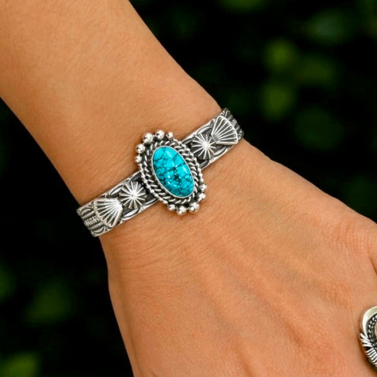 Natural Black Spiderweb Kingman Turquoise cuff handcrafted by Native American artist Michael Calladitto