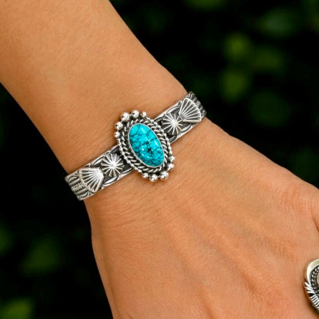 Natural Black Spiderweb Kingman Turquoise cuff handcrafted by Native American artist Michael Calladitto