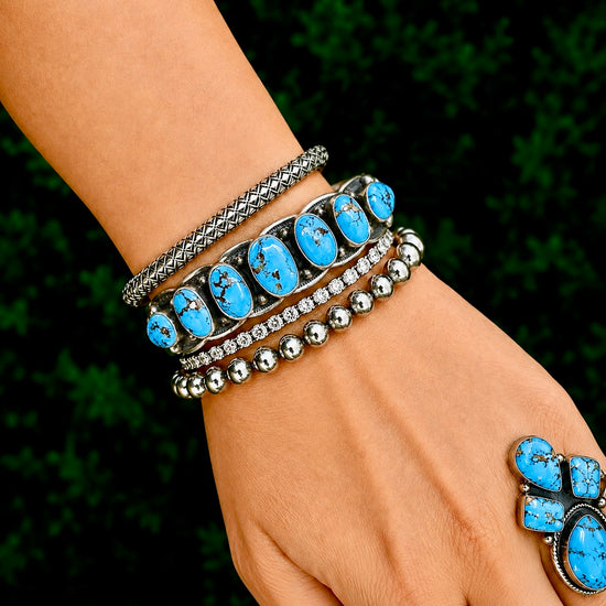 7 Stone Natural Golden Hills Turquoise cuff handcrafted by Native American artist Jereme Delgarito