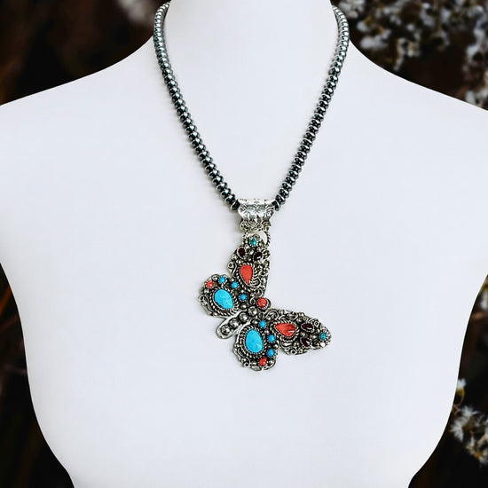 Multi-stone pendant handcrafted by Native American artist Sandra Parkett