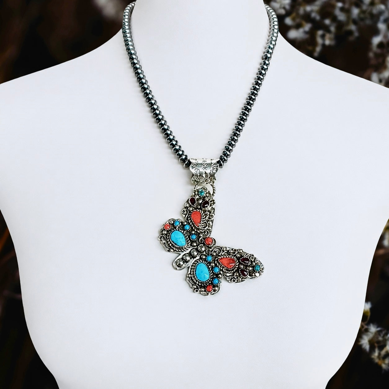 Multi-stone pendant handcrafted by Native American artist Sandra Parkett