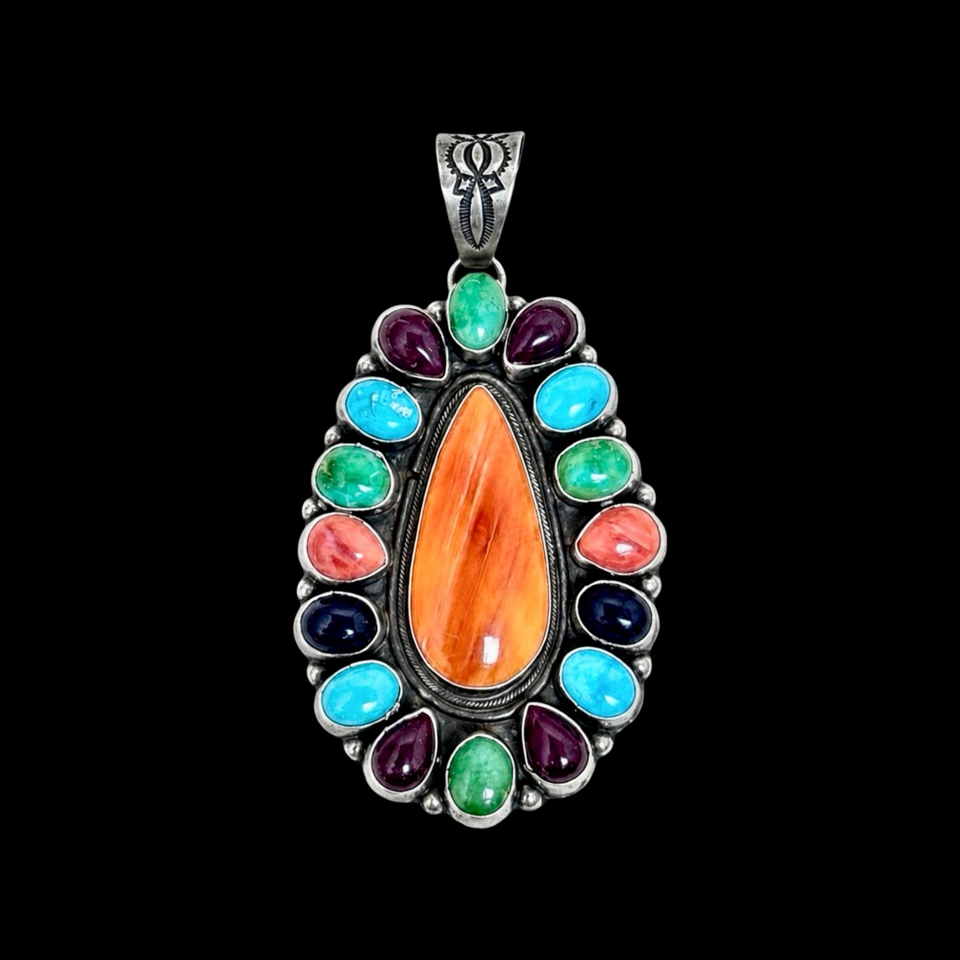 Multi-stone pendant handcrafted by Native American artist Ella Peters