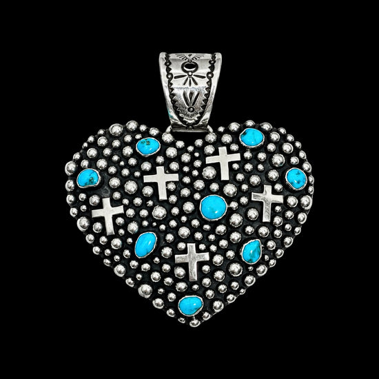 Sleeping Beauty Turquoise pendant handcrafted by Native American artist Akee Douglas