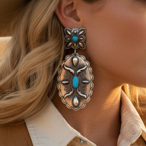 Sleeping Beauty Turquoise and Sterling Silver earrings handcrafted by Native American artist Glenn Livingston