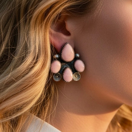 Pink Conch earrings handcrafted by Native American artist Chris Etsitty