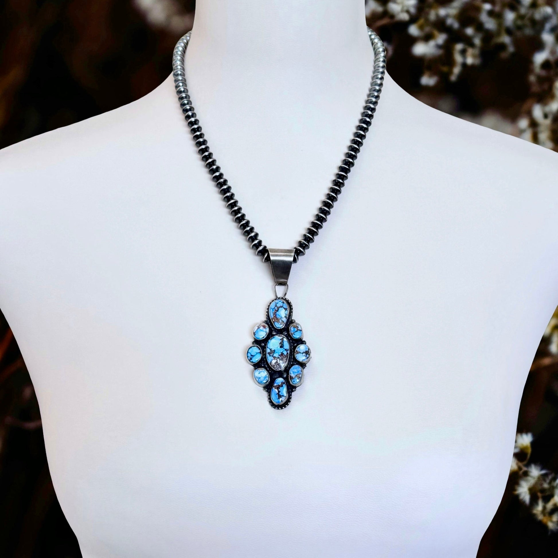 Golden Hills Turquoise pendant handcrafted by Native American artist Travis Jim