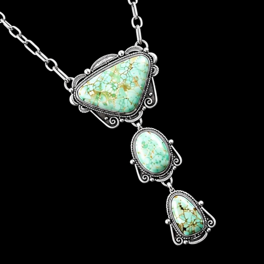 Kingman Turquoise lariat handcrafted by Native American artist Ronald Tom
