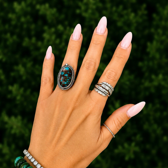 Red Web Kingman ring handcrafted by Native American artist Chris Etsitty