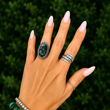 Red Web Kingman ring handcrafted by Native American artist Chris Etsitty
