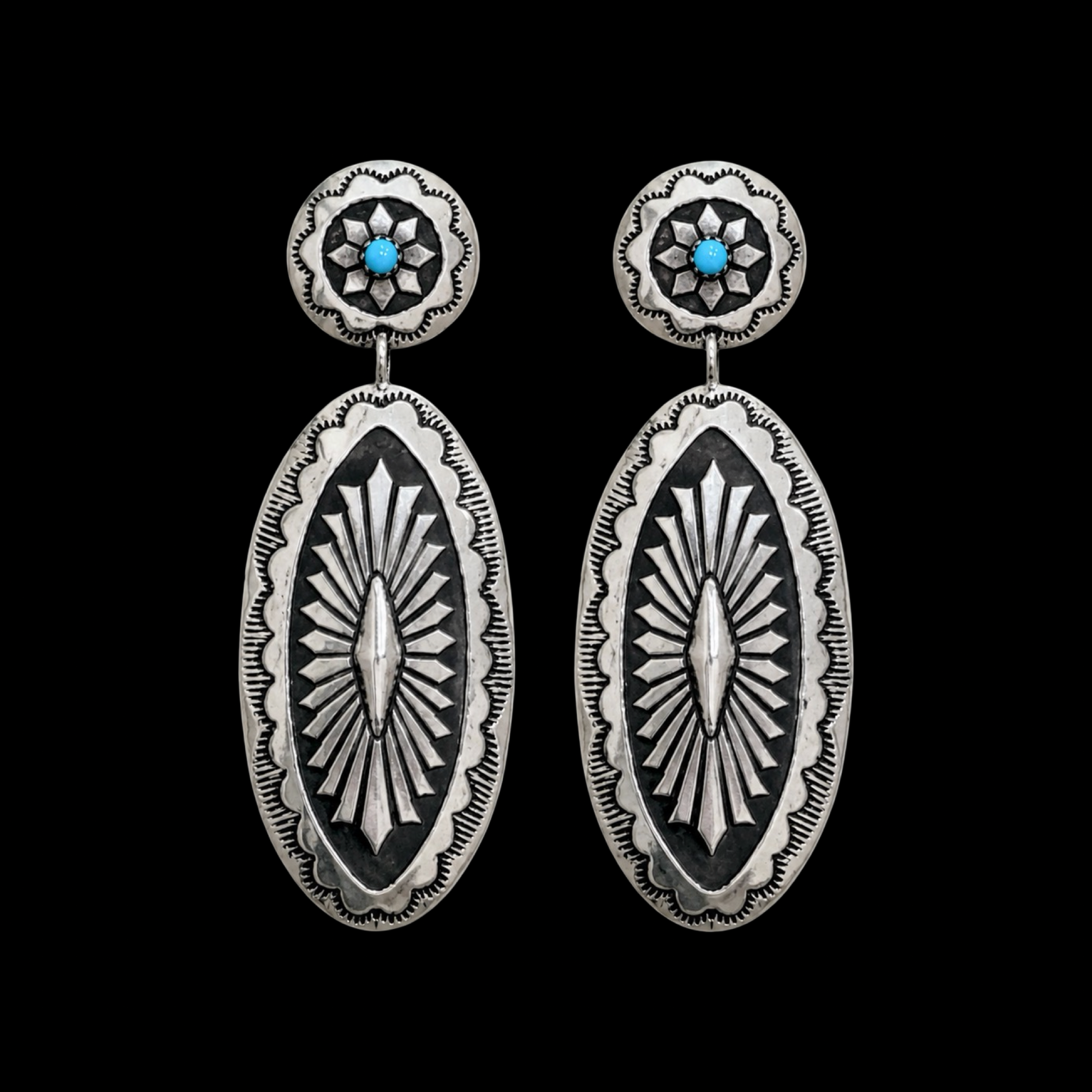 Sterling Silver earrings handcrafted by Native American artist Eric Martinez
