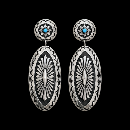 Sterling Silver earrings handcrafted by Native American artist Eric Martinez