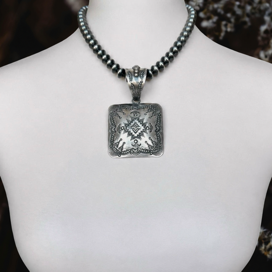 Sterling Silver pendant handcrafted by Native American artist Vincent Platero