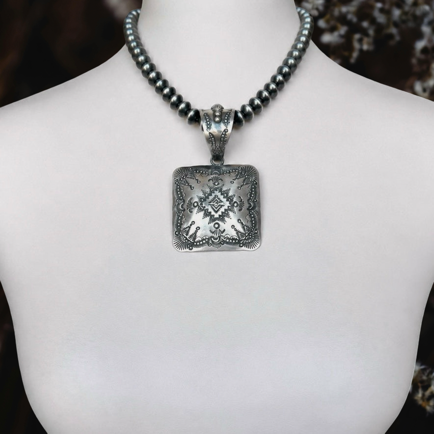 Sterling Silver pendant handcrafted by Native American artist Vincent Platero