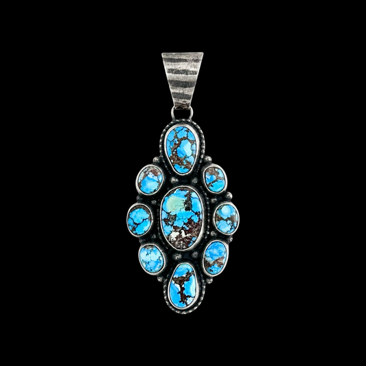 Golden Hills Turquoise pendant handcrafted by Native American artist Travis Jim