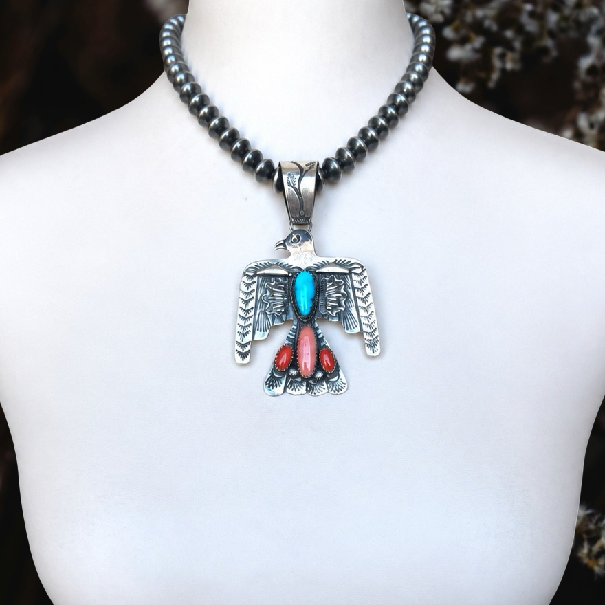 Multi-stone pendant handcrafted by Native American artist Richard Yazzie