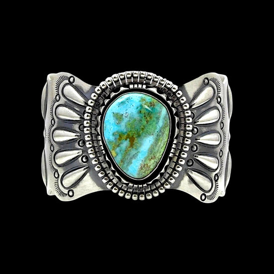Natural Candelaria Turquoise bracelet handcrafted by Native American artist Raymond Delgarito