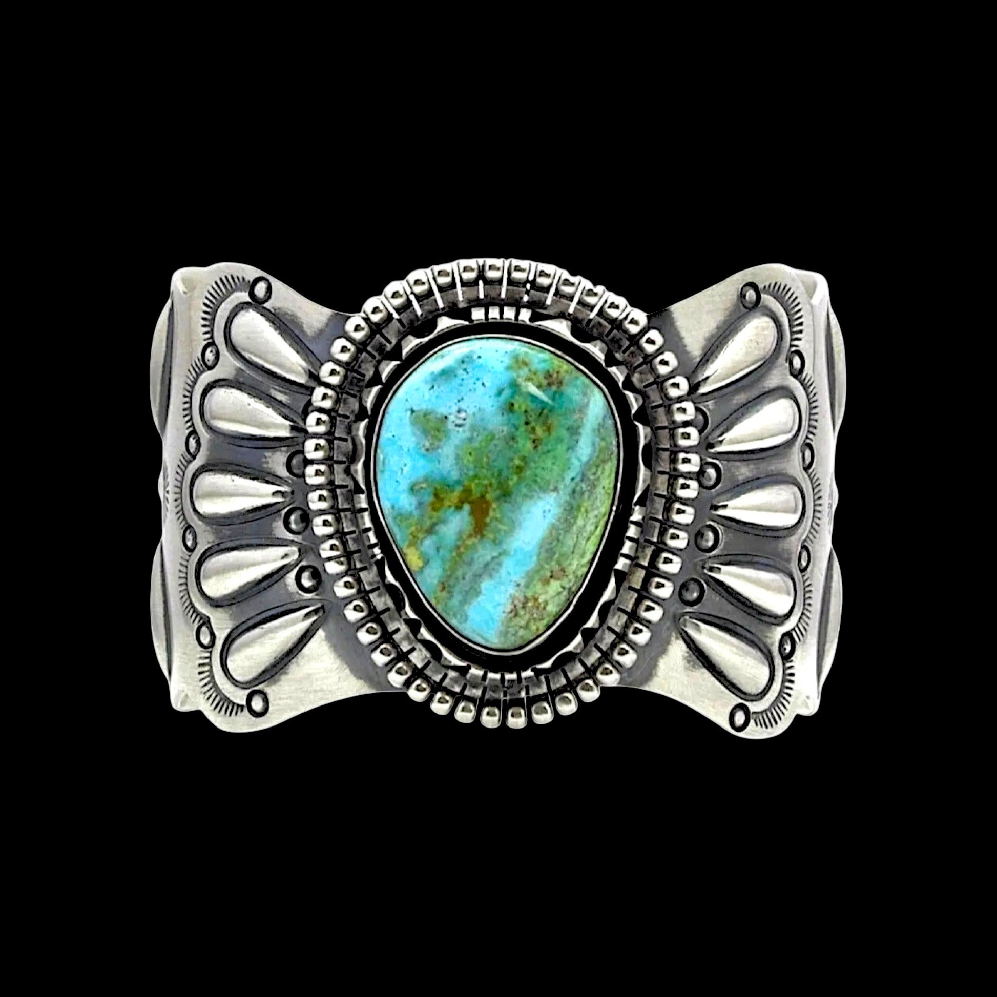 Natural Candelaria Turquoise bracelet handcrafted by Native American artist Raymond Delgarito