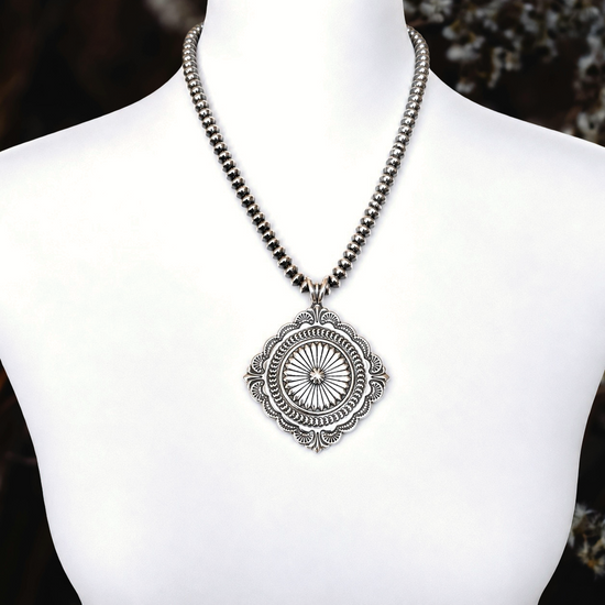 Sterling Silver pendant handcrafted by Native American artist Sunshine Reeves