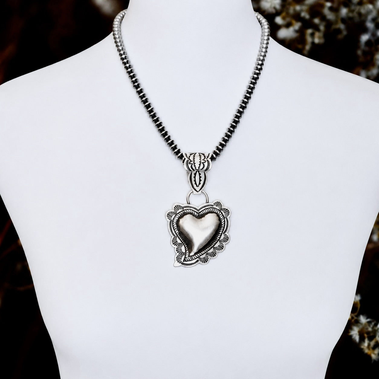 Sterling Silver pendant handcrafted by Native American artist Leander Tahe