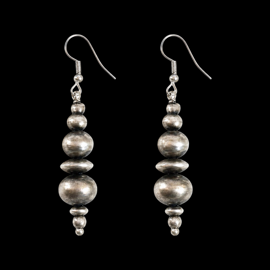 Sterling Silver earrings handcrafted by Native American artist Dorinda Mariano