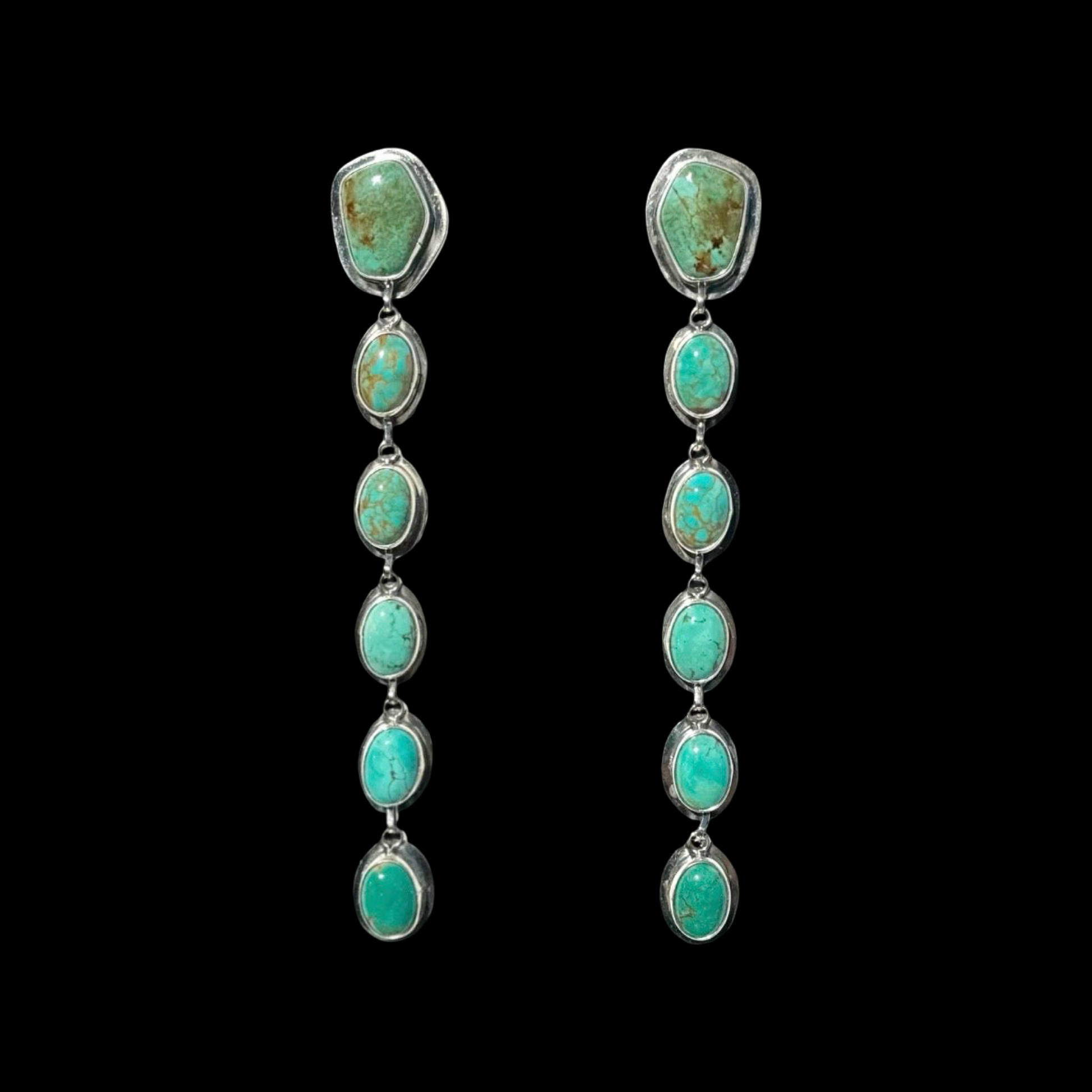 Tyrone Turquoise earrings handcrafted by Native American artist Paul Livingston