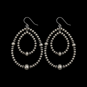 Sterling Silver earrings handcrafted by Native American artist Louisa Joe