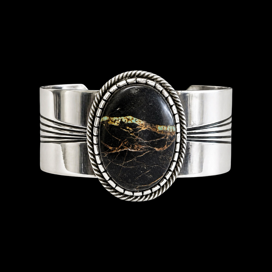 Blackjack Turquoise cuff handcrafted by Native American artist Leonard Nez