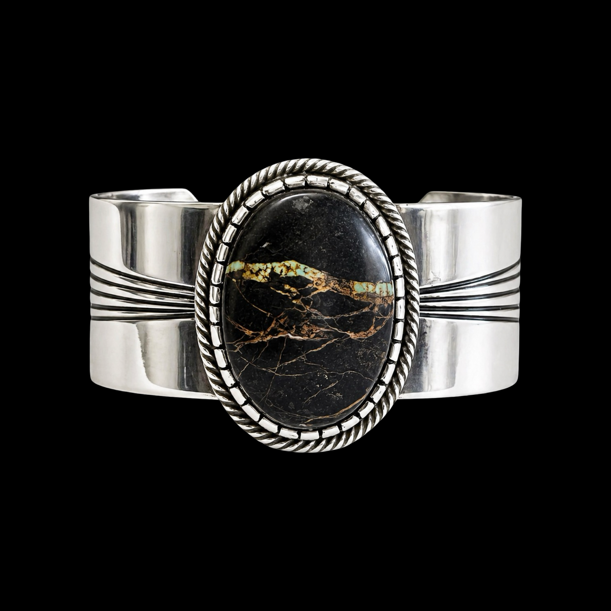 Blackjack Turquoise cuff handcrafted by Native American artist Leonard Nez