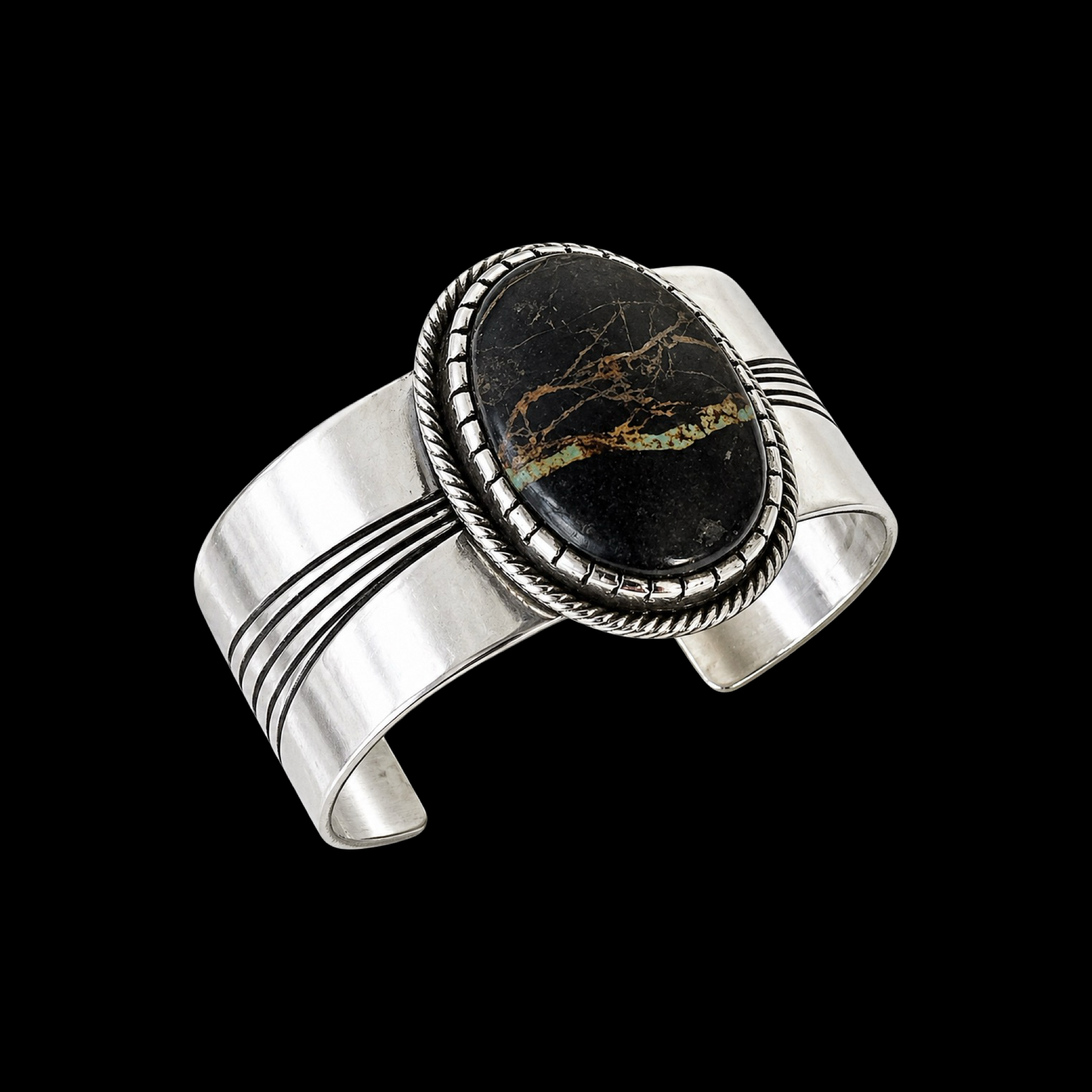 Blackjack Turquoise cuff handcrafted by Native American artist Leonard Nez